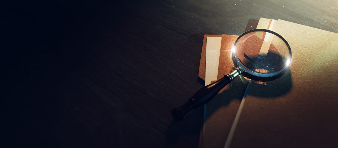 Magnifying glass and some paper folders on a table (3D Rendering, illustration)