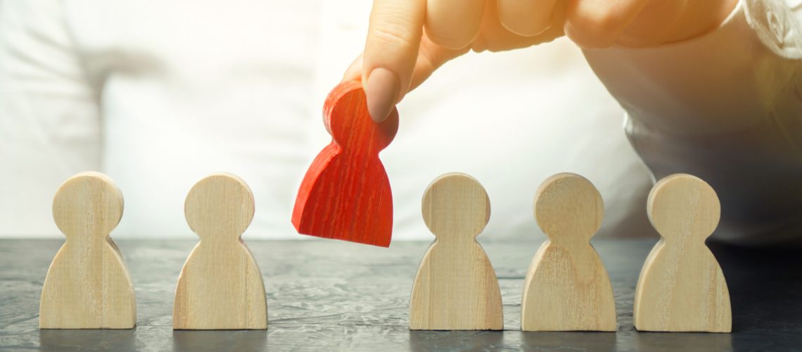 Businesswoman dismisses the employee from the team. Personnel Management. Bad worker. Demotion. The concept of finding people and workers on the job. Selection of teams, the appointment of a leader.